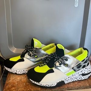 Like green and black tennis shoes.